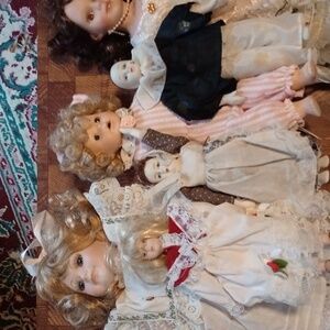 Porcelain dolls - lot of six, three large three small. Vintage.